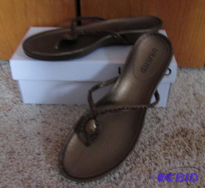 lot 85 image: Unlisted brown sandles, size unknown guessin...