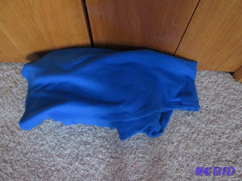 lot 86 image: light blue snuggie...