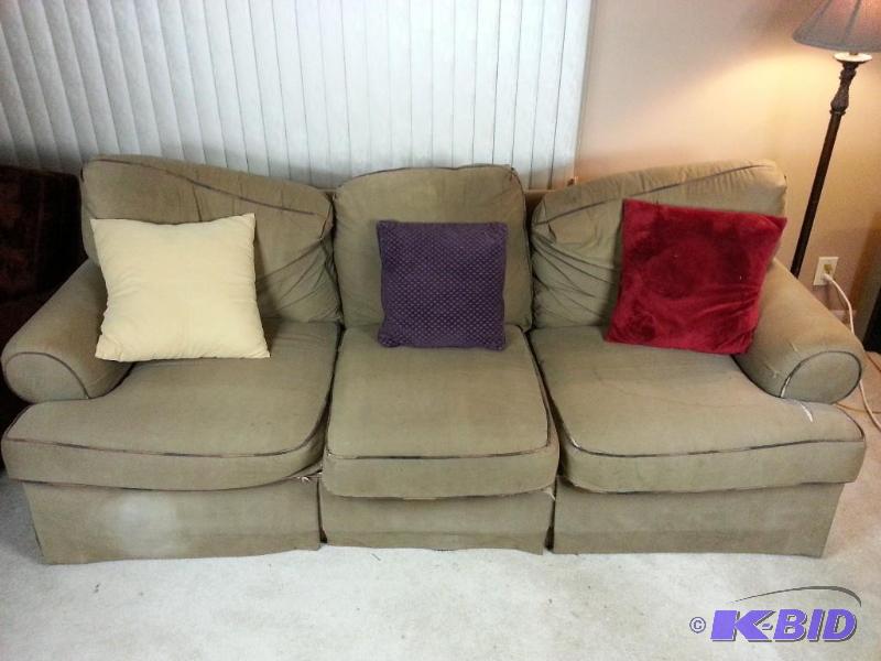 lot 133 image: Tan Sofa  Couch w (3) Accent Pillows