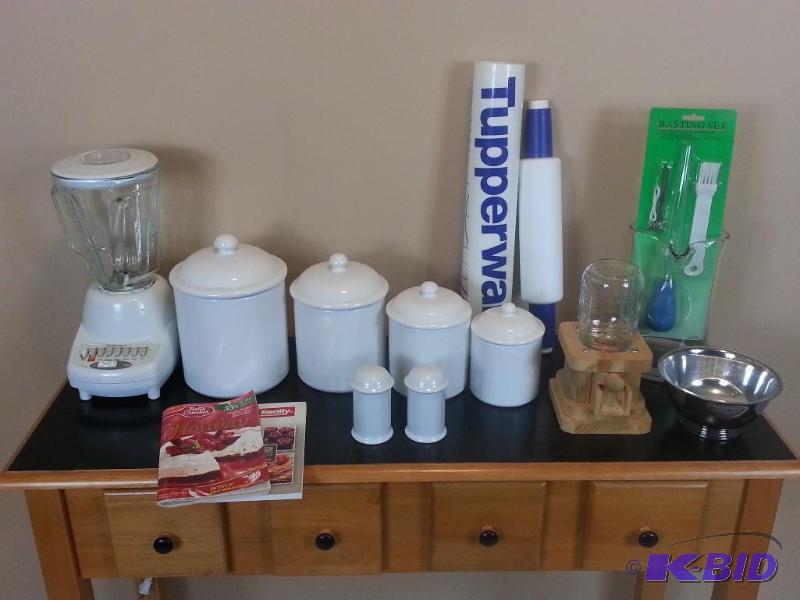 lot 49 image: Kitchen Lot Hamilton Beach Blender, (4) Ceramic Jars, Tupperware Pie Kit, Nut Dispenser  More