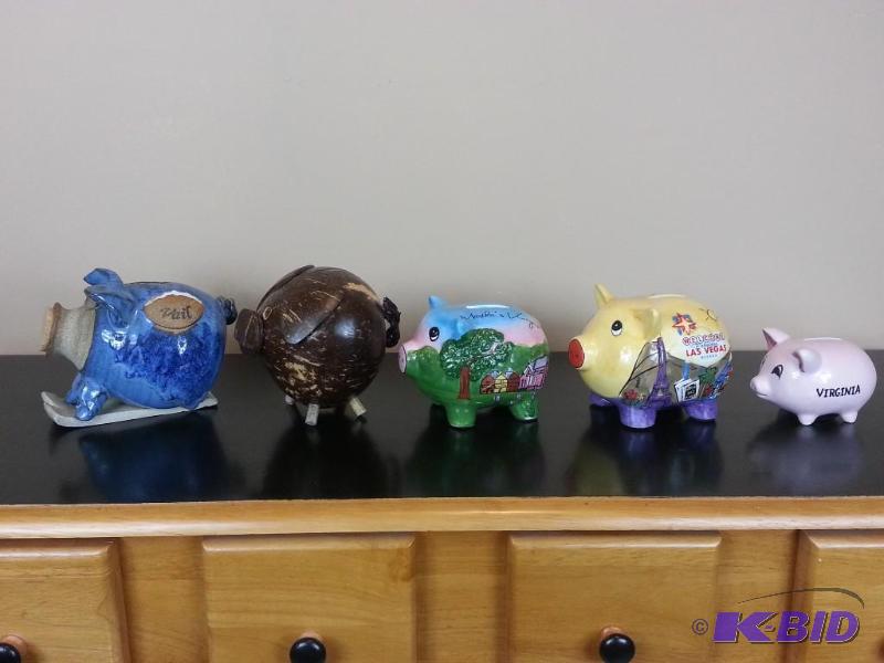 lot 54 image: Lot of (5) Decorative Collectible Piggy Banks - Vail, Coconut, Marthas Vineyard, Vegas, Virginia