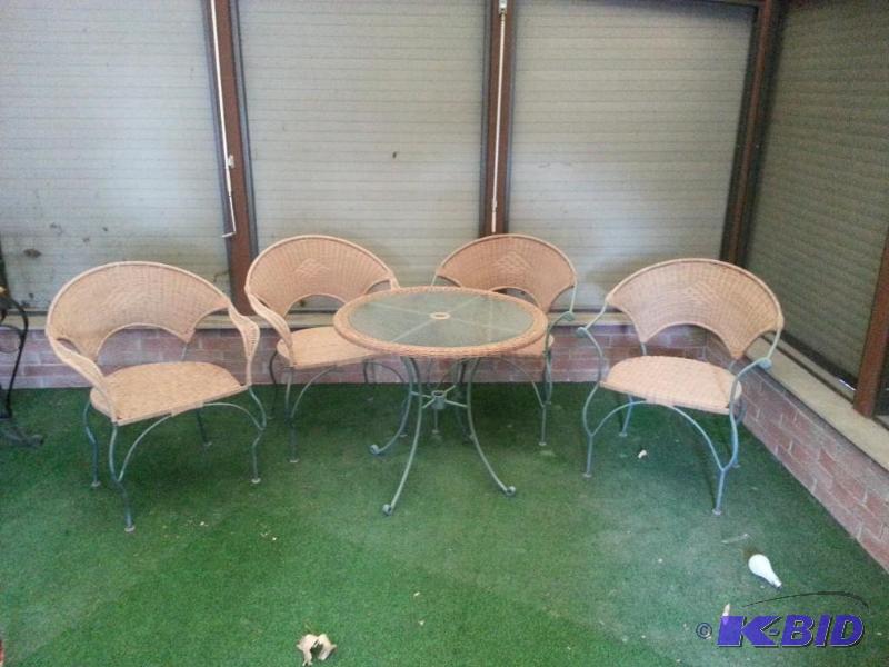 lot 7 image: (4) Wicker Chairs  Wicker Table Patio Set
