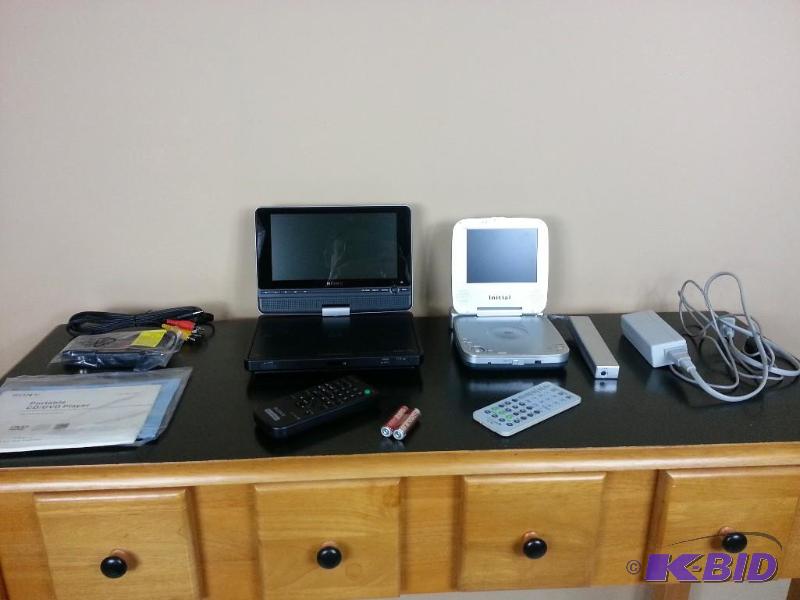 lot 73 image: Sony 8 Portable DVD Player w Swivel Monitor & Remote  Initial DVD Player w Remote