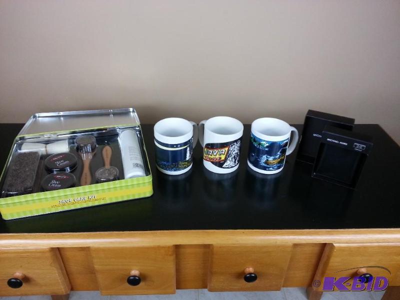 lot 88 image: Shoeshine Kit, Michael Kors Leather Wallet, and Temperature Changing Coffee Mugs