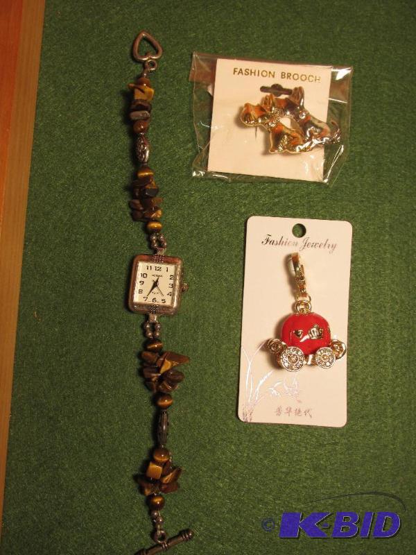 lot 144 image: Brooch, Key Chain and Watch