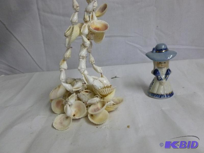 lot 66 image: Sea Shells and a Small Figurine