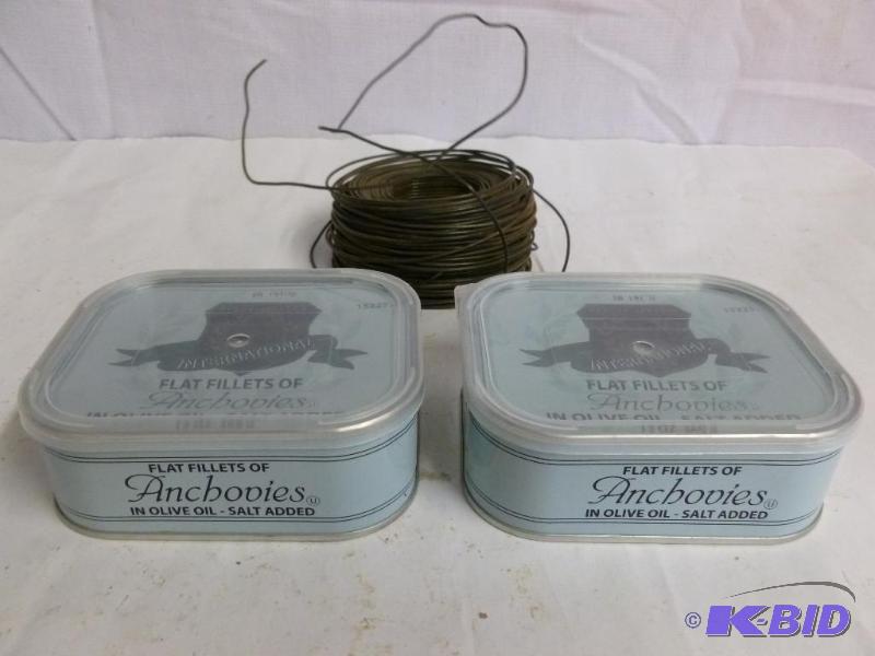 lot 91 image: 2 Large Cans of Anchovies - and a bunch of wire