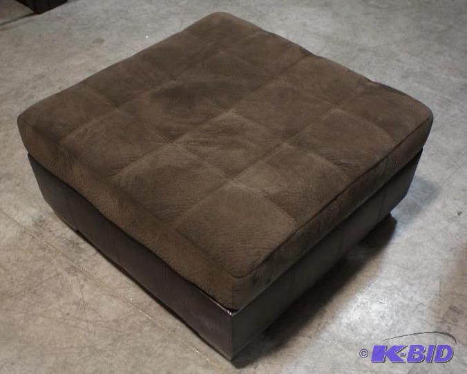 lot 12 image: New Ashley Signature Ottoman - Brown cloth to...