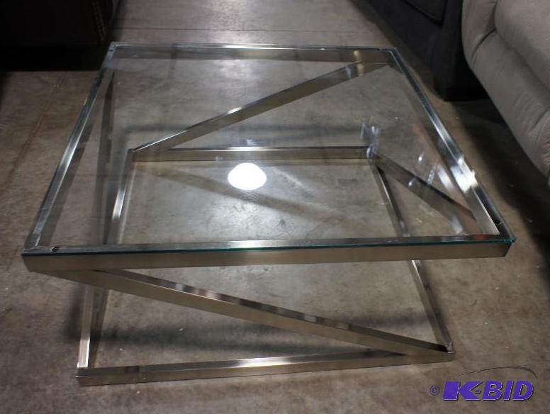 lot 29 image: New Ashley Signature Coffee Table wglass top...