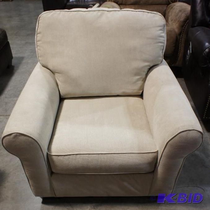 lot 8 image: New Ashley Signature Cloth Chair - MSRP $179....