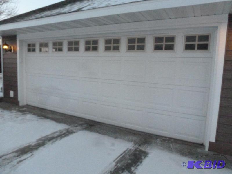 lot 1 image: 7x18 Insulated Garage Door wGenie Screw Drive Opener