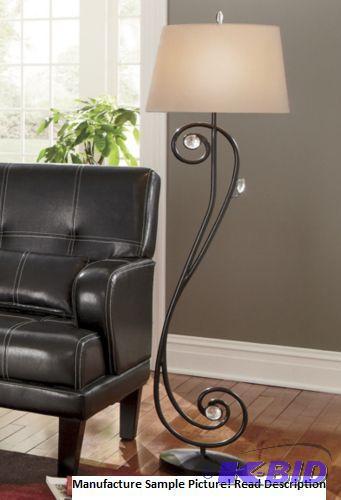 lot 104 image: Precious Scrolls Metal Floor Lamp - Some migh...