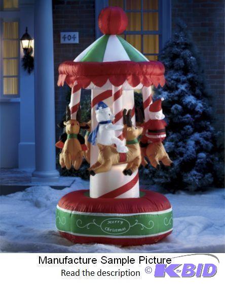 lot 44 image: Inflatable Christmas Merry Go Round  - Everyo...
