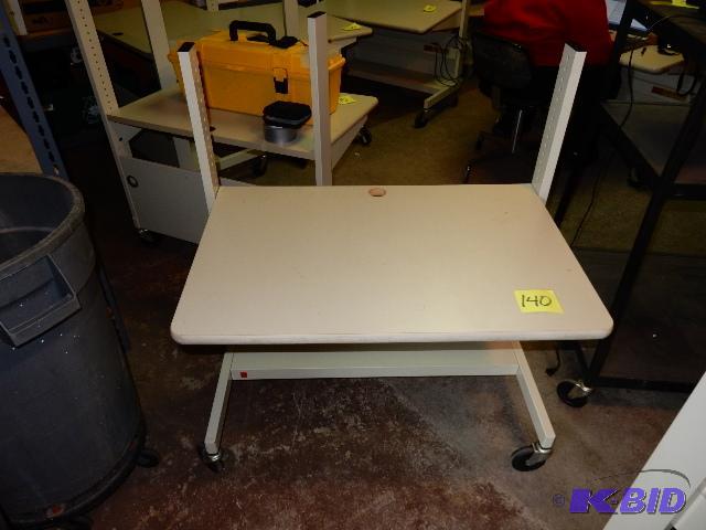 lot 140 image: Metal Rolling Desk