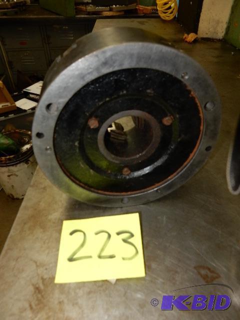 lot 223 image: Lathe chuck with wrench.