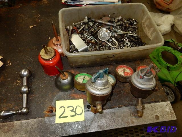 lot 230 image: Gauges, oil cans, and more.