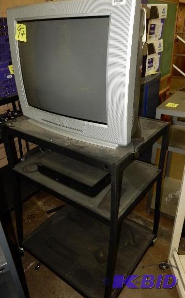 lot 97 image: Magnavox TV, DVDVHS Player and AV Cart.