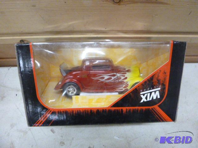 lot 45 image: 1934 Ford Coupe Wix metal die cast care, 125...
