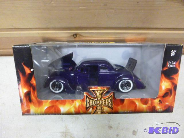 lot 54 image: Ford Coupe West Coast Choppers metal die cast...