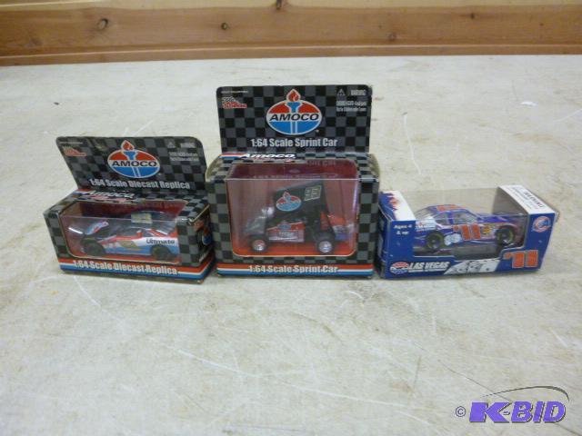 lot 96 image: Three 164 Scale Cars...
