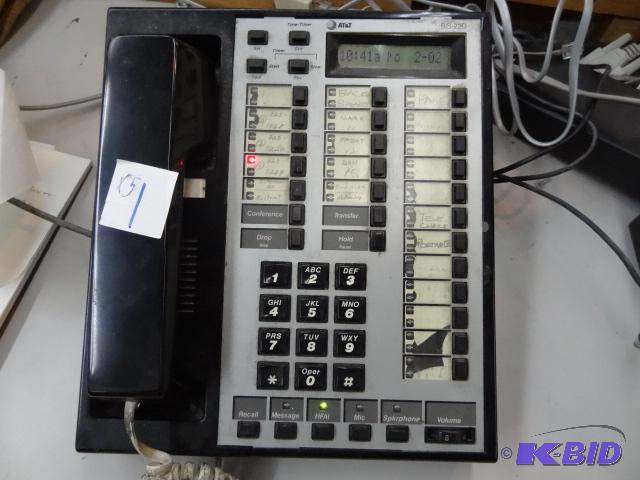 lot 1 image: AT and T Merlin phone system. 4 phones. 4 lin...
