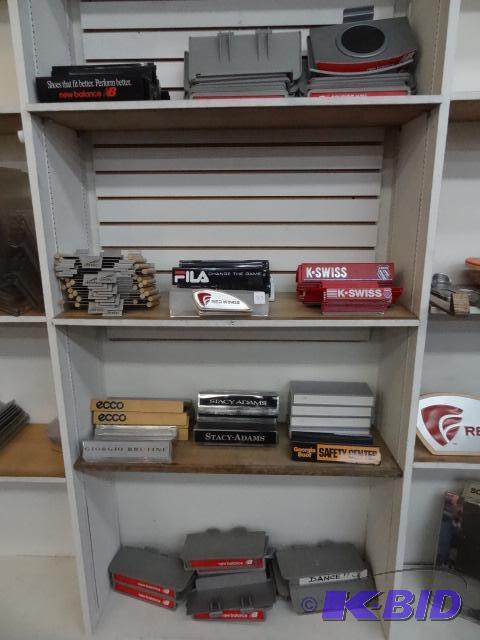 lot 27 image: Slat wall shoe displays....