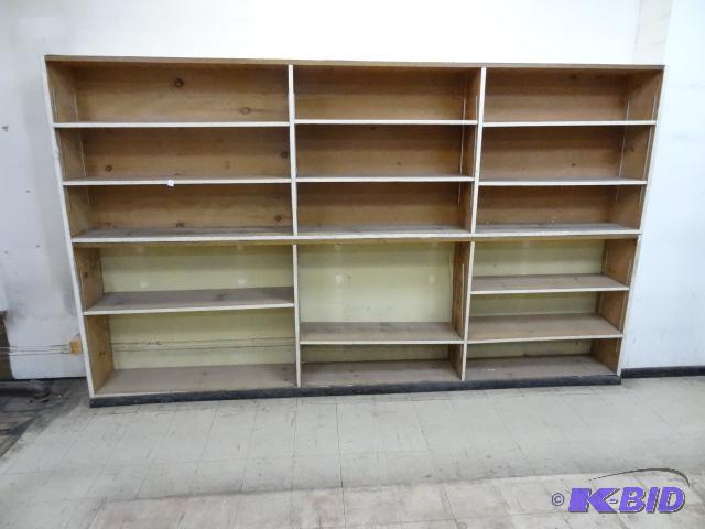 lot 29 image: Wood shelving unit. Buyer removes. 128 x 12 x...