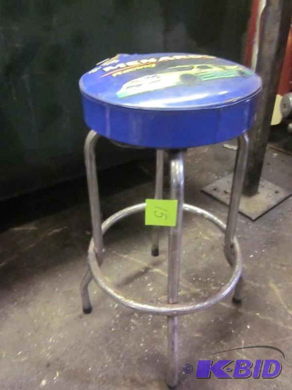 lot 15 image: Menards Racing stool, chrome legs, top has so...