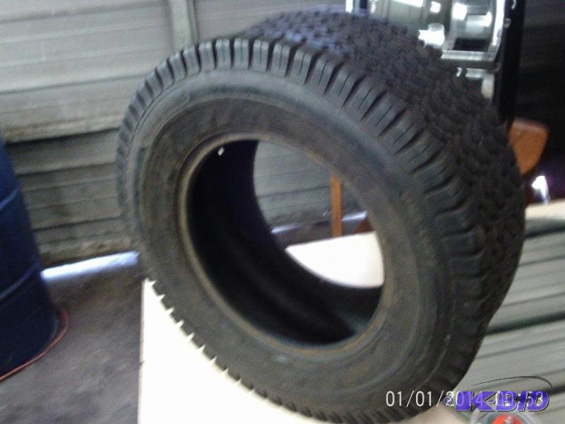 lot 31 image: 25 x 3.5 R12 tire....