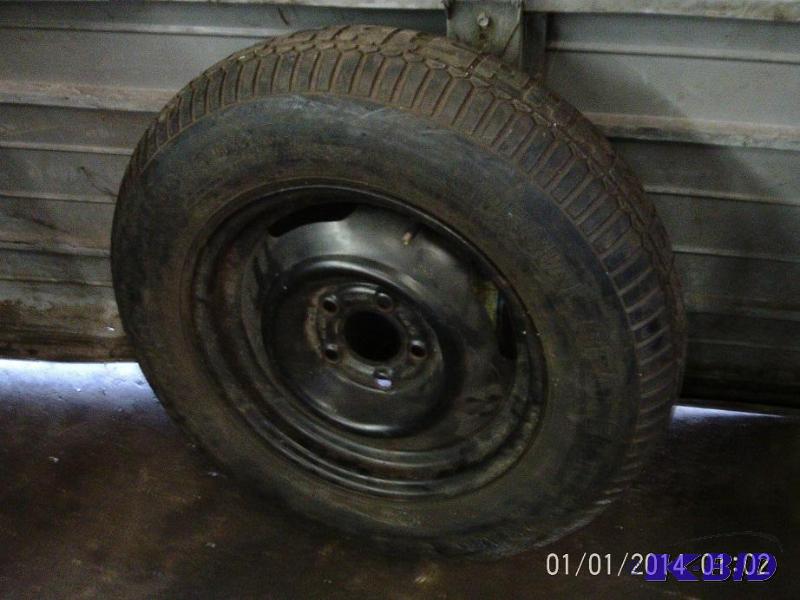 lot 35 image: 5 lugg Special spare tire with rim....