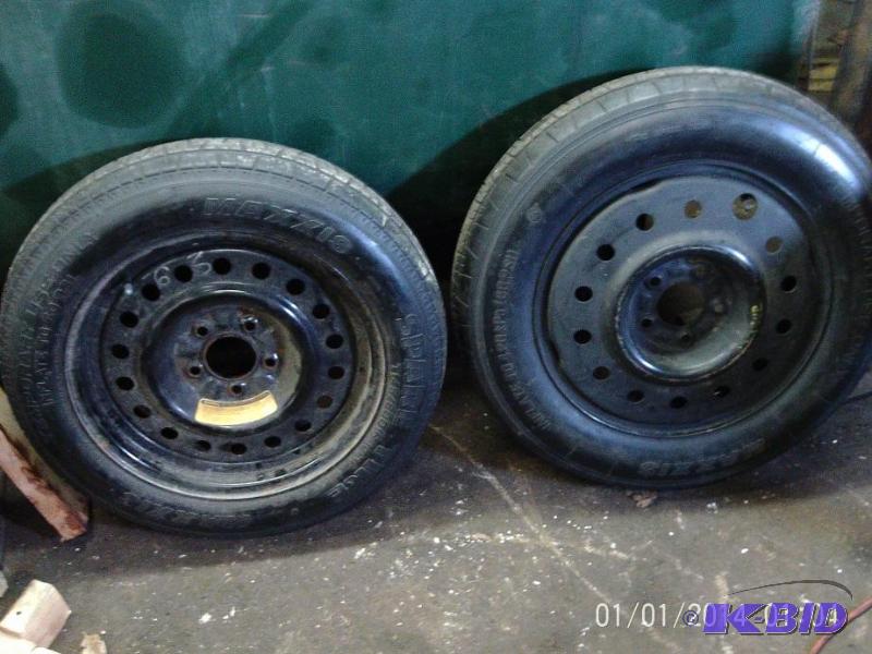 lot 36 image: Pair of spare tires with rims....