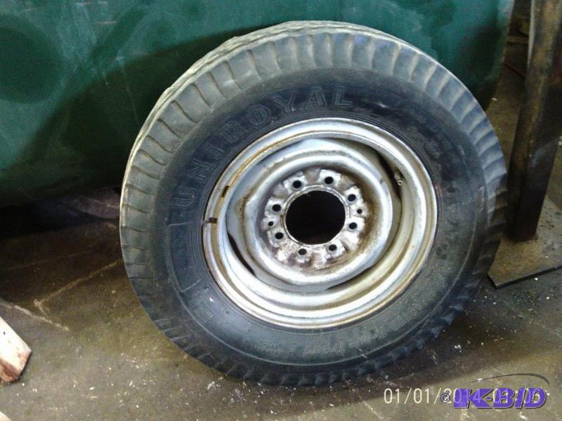 lot 37 image: 8 bolt trailer tire with rim....
