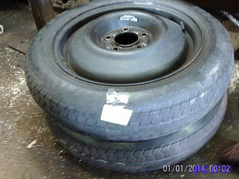 lot 43 image: Pair of temporary tires with rims....