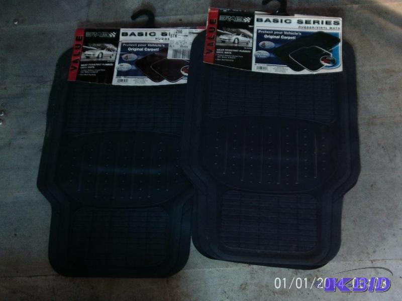 lot 49 image: Two sets of floor mats, includes fronts and b...