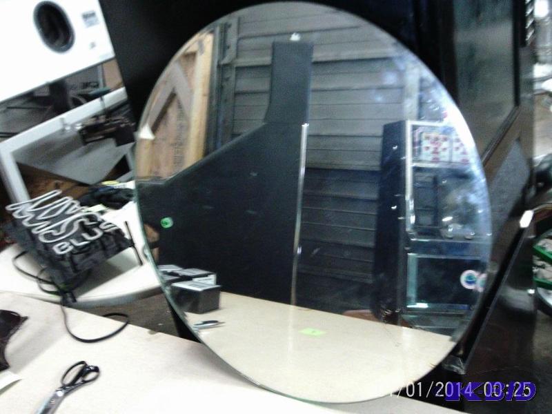 lot 64 image: 30 inch round mirror....
