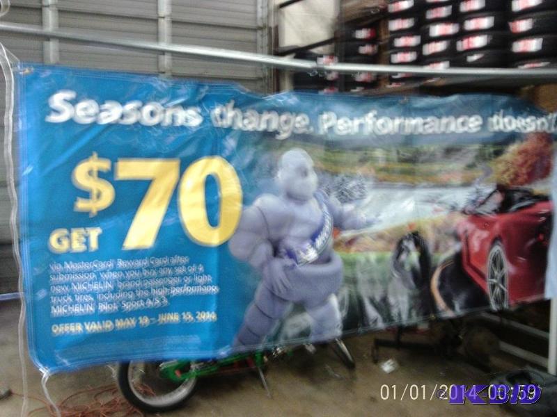 lot 82 image: 10 foot vinyl advertising banner....