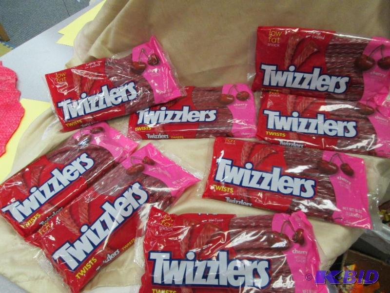 lot 17 image: Qty 8 pkg of Twizzlers cherry flavor...