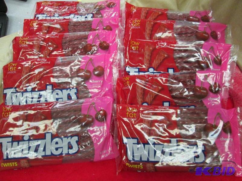 lot 84 image: Qty 10 pkg of Twizzlers cherry EXP 102014...