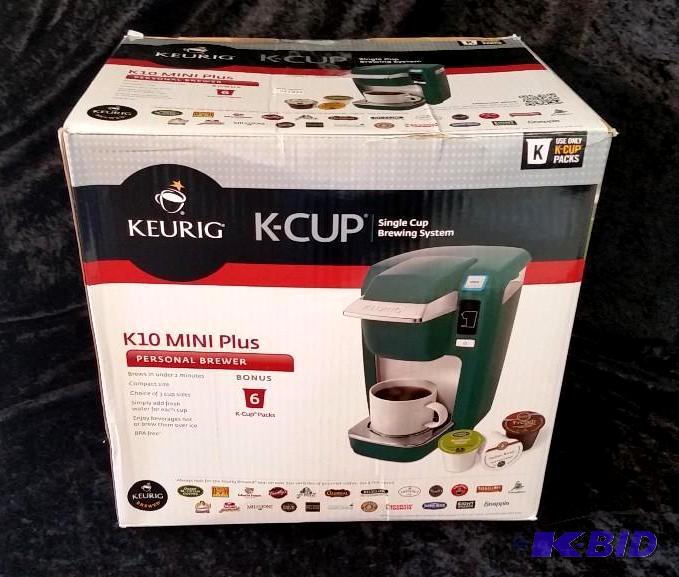 lot 0 image: Keurig MINI Plus Personal K-Cup Brewing System.  New in Box.  Powers on.