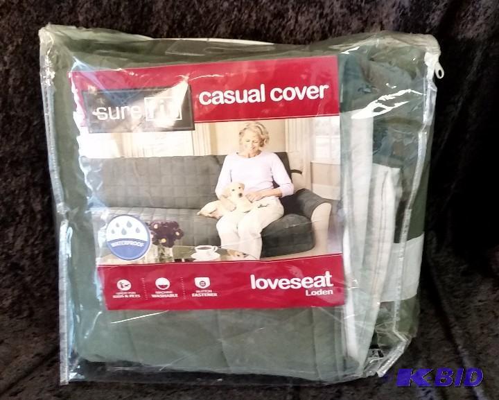 lot 61 image: Sure Fit Soft Suede Waterproof Love seat Cover.  New in Bag  Loden or Olive Green