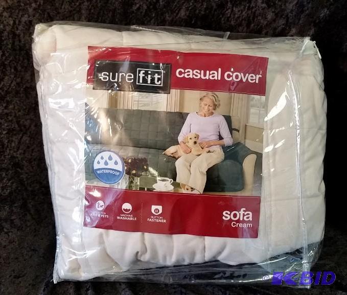 lot 63 image: Sure Fit Soft Suede Waterproof Sofa Cover.  New in Bag Cream