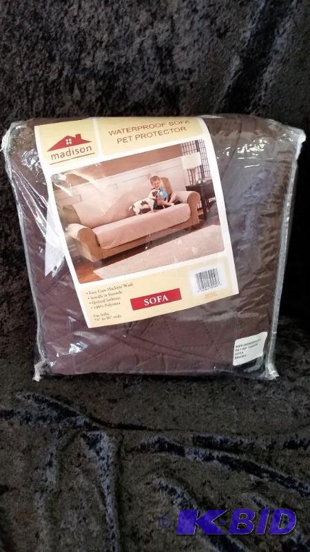 lot 64 image: Madison Ind. Waterproof Pet Protector.  New in Package