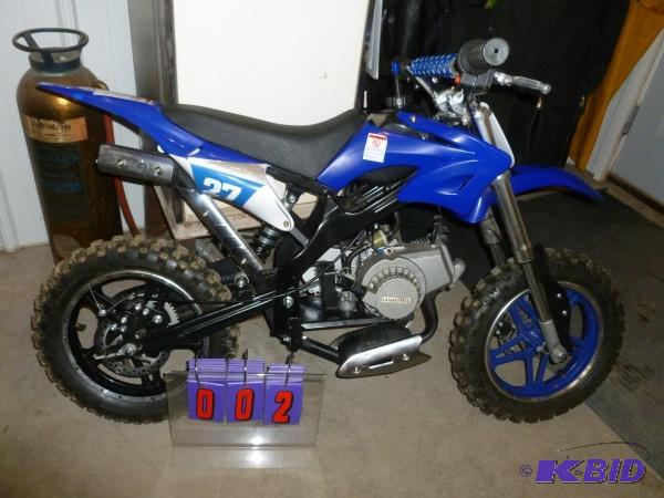 49cc 2 cycle childs mini dirtbike. Appears to...