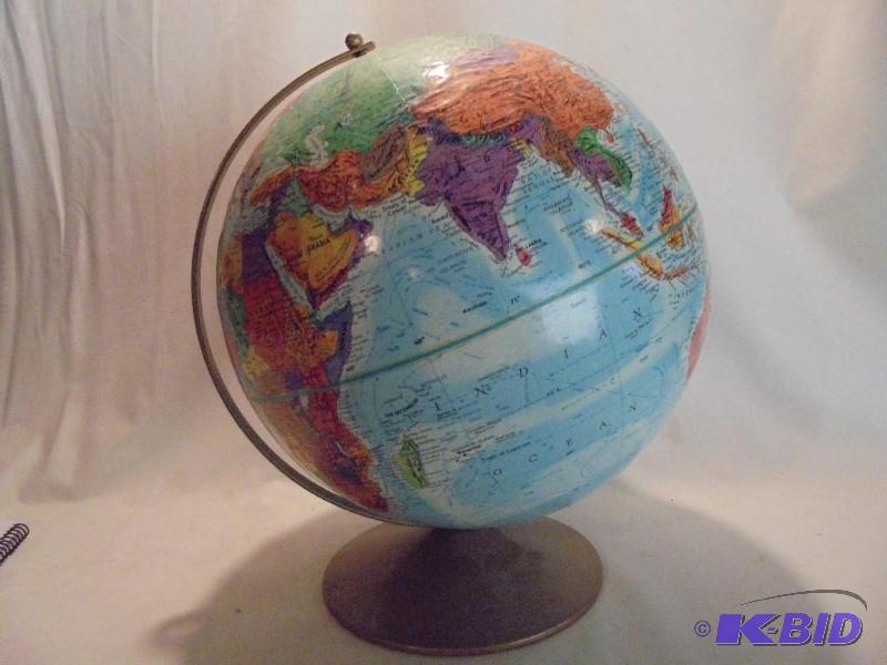 Vintage globe with metal base. &nbsp...