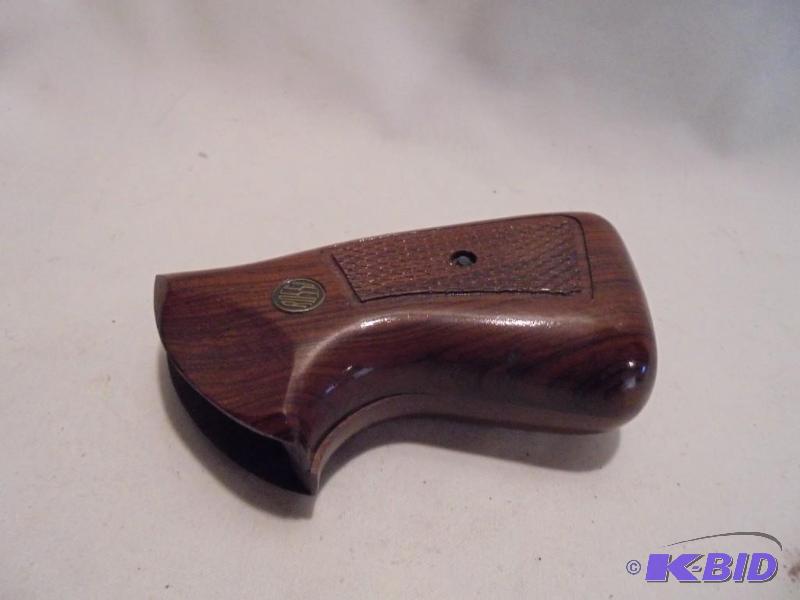 Rossi wood handgun handle. &nbsp...