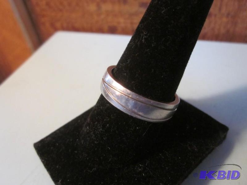 Size 10 Titanium wedding band. &nbsp...