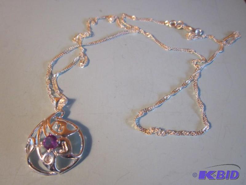 Sterling silver necklace with purple stone....