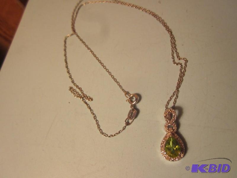 Sterling Silver necklace set with green stone...