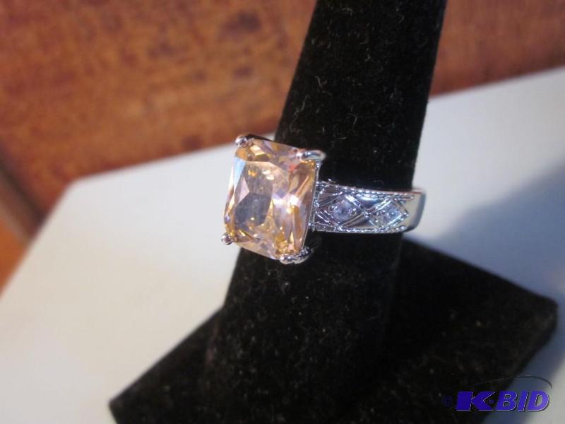 Size 8 .925 ring set with large pink stone....