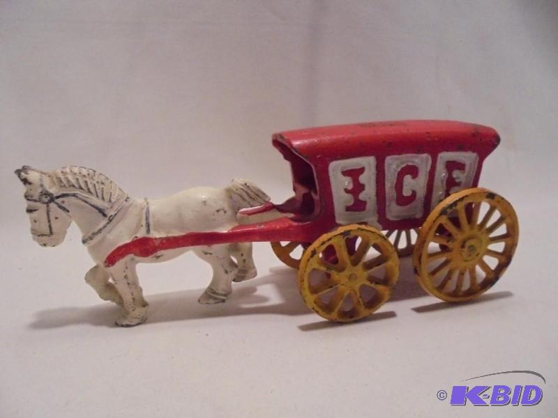 Large antique cast iron horse and Ice wagon....